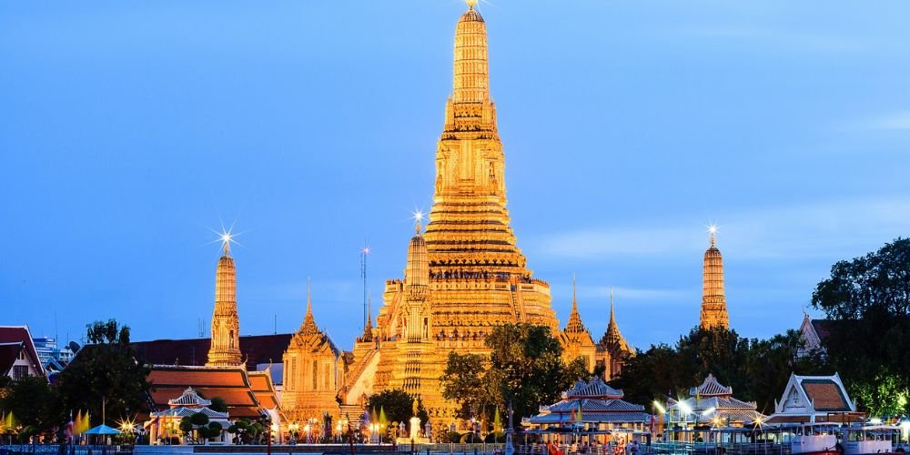 Wat Arun - temple’s riverside beauty and intricate porcelain design.